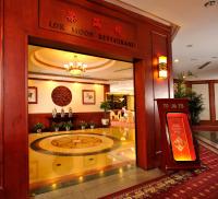 a lobby of a hotel with a sign that reads lo moon restaurant at Felicity Hotel Shenzhen, Luohu Railway Station in Shenzhen