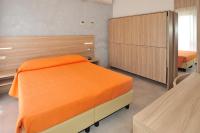Posteľ alebo postele v izbe v ubytovaní Hotel Lidia