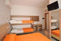 Posteľ alebo postele v izbe v ubytovaní Hotel Lidia