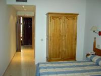 Postel nebo postele na pokoji v ubytování Hostal Centro