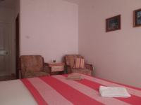 Postel nebo postele na pokoji v ubytování Apartments Erceg