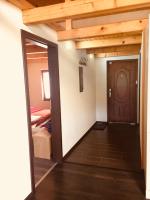 A bed or beds in a room at Grand Spa Holiday Home