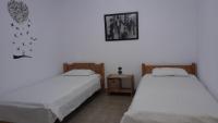 Posteľ alebo postele v izbe v ubytovaní Anastasia' s guest house