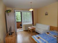 A bed or beds in a room at Apartmán Zdravie Horný Smokovec