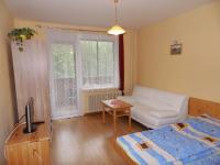 A bed or beds in a room at Apartmán Zdravie Horný Smokovec