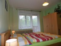 A bed or beds in a room at Apartmán Zdravie Horný Smokovec