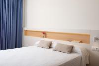 Posteľ alebo postele v izbe v ubytovaní Prestige Sant Marc