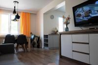Telewizja i/lub zestaw kina domowego w obiekcie Apartament Mieszczański