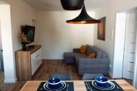 Telewizja i/lub zestaw kina domowego w obiekcie Apartament Mieszczański