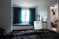 Łóżko lub łóżka w pokoju w obiekcie Apartament Mieszczański