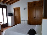 Postel nebo postele na pokoji v ubytování Casa Rural La Antigua Fragua