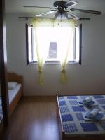 Łóżko lub łóżka w pokoju w obiekcie Villa Welcome