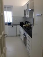 Kuchyň nebo kuchyňský kout v ubytování Cândido Reis Apartments