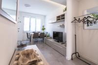 Televízia a/alebo spoločenská miestnosť v ubytovaní Milano Business Balcony Flat