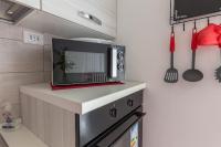 Kuchyňa alebo kuchynka v ubytovaní Milano Business Balcony Flat