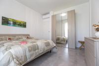 Posteľ alebo postele v izbe v ubytovaní Milano Business Balcony Flat