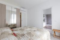 Posteľ alebo postele v izbe v ubytovaní Milano Business Balcony Flat