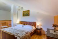Posteľ alebo postele v izbe v ubytovaní Apartmani Zorica