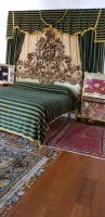 A bed or beds in a room at Palazzo Viola Suite Panoramica Palermo