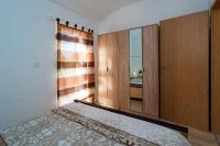 Posteľ alebo postele v izbe v ubytovaní Apartments Intrada