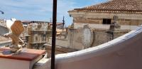 A balcony or terrace at Palazzo Viola Suite Panoramica Palermo