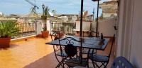A balcony or terrace at Palazzo Viola Suite Panoramica Palermo