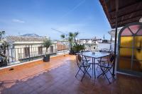 A balcony or terrace at Palazzo Viola Suite Panoramica Palermo