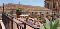 A balcony or terrace at Palazzo Viola Suite Panoramica Palermo