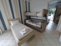 Posteľ alebo postele v izbe v ubytovaní Filanthi Apartments