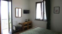 A television and/or entertainment centre at Hotel San Remo