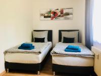 Postel nebo postele na pokoji v ubytování KriDa Comfort Ferienwohnung