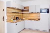 Kuchyňa alebo kuchynka v ubytovaní Apartament Blue Point 102 PREMIUM