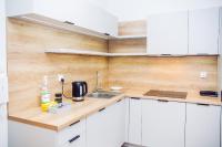 Kuchyňa alebo kuchynka v ubytovaní Apartament Blue Point 102 PREMIUM