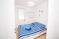 Posteľ alebo postele v izbe v ubytovaní Apartament Blue Point 102 PREMIUM