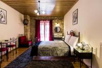 Posteľ alebo postele v izbe v ubytovaní Village Inn