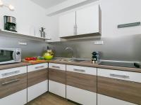 Kuchyň nebo kuchyňský kout v ubytování Pool Premium Apartment