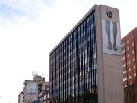 a tall building with a picture of socks on it at Hotel San Francisco de Asís in Bogotá