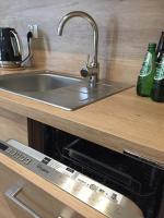 Kuchyňa alebo kuchynka v ubytovaní Lux Apartment Kołobrzeg Polanki Park