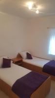 Postel nebo postele na pokoji v ubytování Apartments Rotim