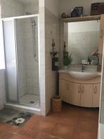 a bathroom with a shower and a sink at FeWo s Runde Wiese RW in Greifswald