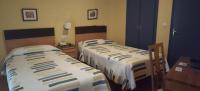 Posteľ alebo postele v izbe v ubytovaní Hostal Guzman El Bueno by gaiarooms