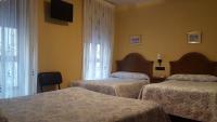 Posteľ alebo postele v izbe v ubytovaní Hostal Guzman El Bueno by gaiarooms