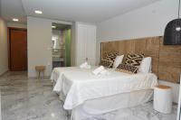 Postel nebo postele na pokoji v ubytování Candia Suites & Rooms
