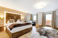 Posteľ alebo postele v izbe v ubytovaní Hotel Jägerheim 3S