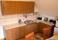 Kuchyňa alebo kuchynka v ubytovaní SeSil Apartman