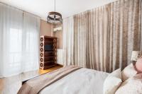 A bed or beds in a room at Acropolis Stylish Suite