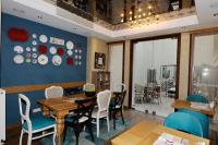 a dining room with a table and chairs at Collage Taksim Hotel in Istanbul