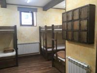 Postel nebo postele na pokoji v ubytování Albergue Villa de Bulnes