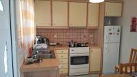 Kuchyňa alebo kuchynka v ubytovaní Port View Apartment
