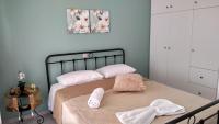 Posteľ alebo postele v izbe v ubytovaní Port View Apartment